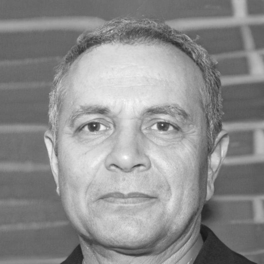 Professional headshot of testimonial author